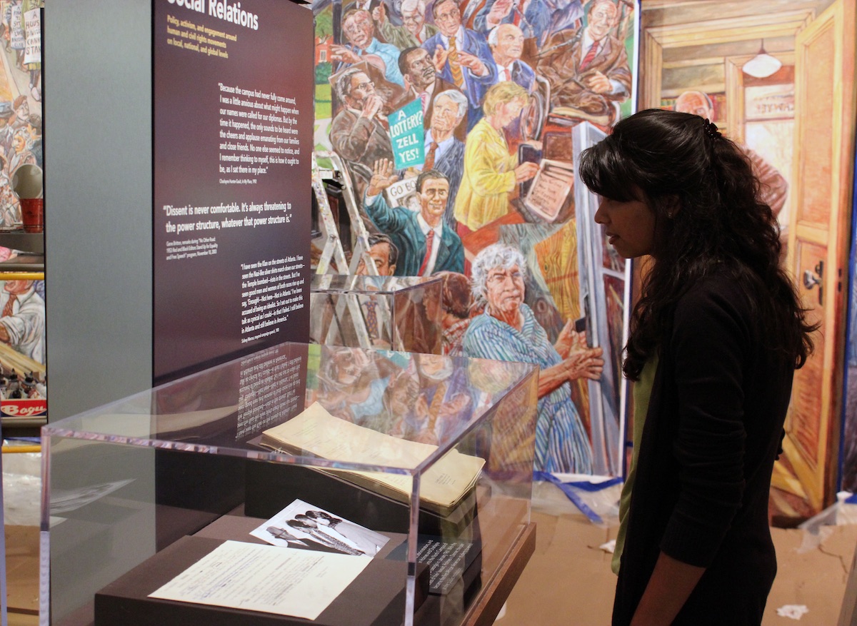 Student viewing an exhibit in the Russell Library’s History Lives! Showcase Gallery.