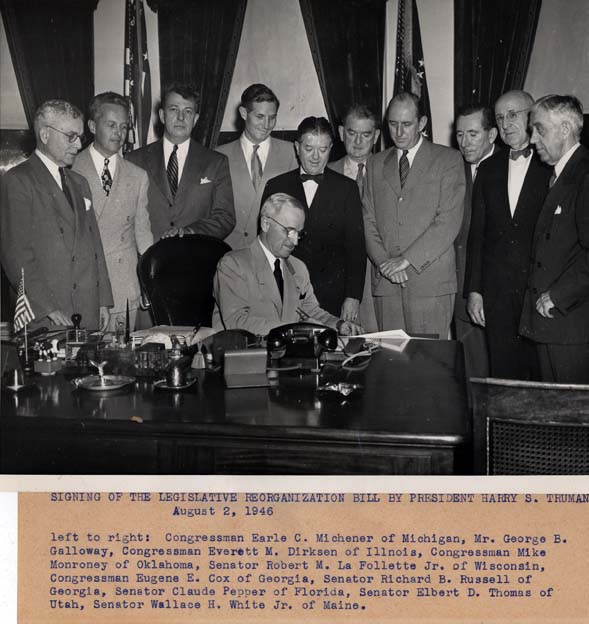 President Harry S. Truman signing the NSLP legislation in August 1946