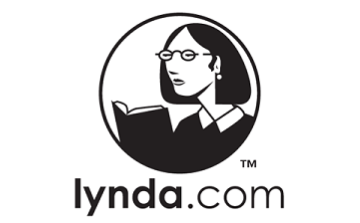 Image of a woman holding a book as the Lynda logo