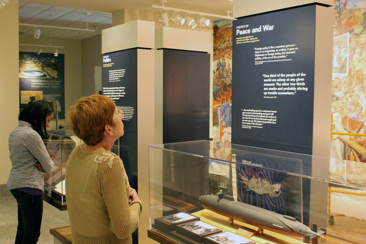 Students viewing History Lives! Showcase Gallery