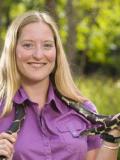 Photo of Kimberly Andrews with a snake